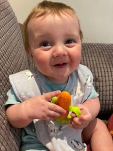 ezra with a carrot teether