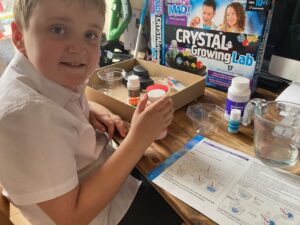 Ethan unboxing the Science Mad Crystal Growing Kit 