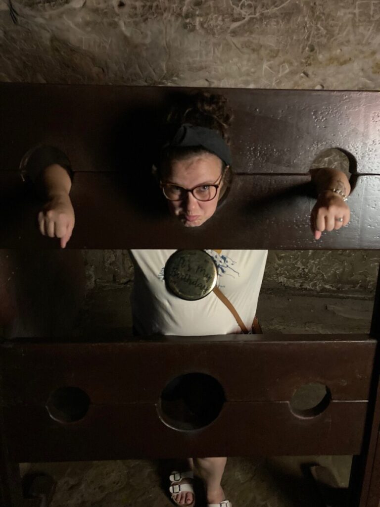 Megan in the stocks at Smugglers Adventure